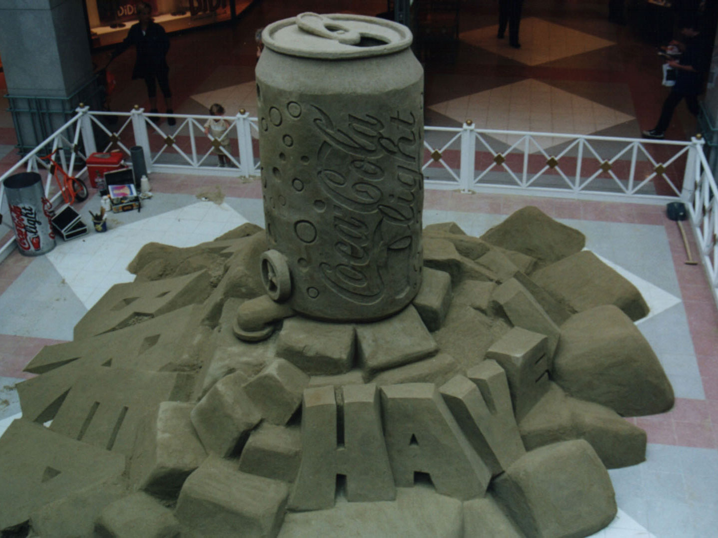 Coca-Cola can out of Sand